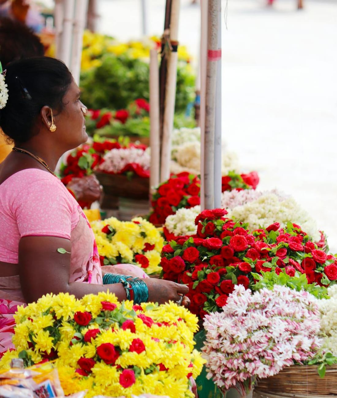 A florist arranging a fresh bouquet at Hayley's Flower Shop
